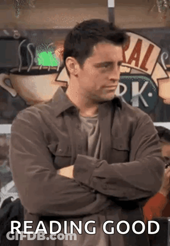 Man Standing With Reading Good Sign GIF
