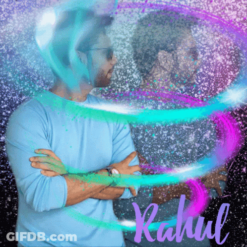 A Man With His Arms Crossed Is Surrounded By A Colorful Swirl And The Name Rahul Is Visible GIF