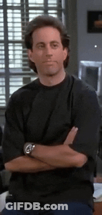 A Man With His Arms Crossed Is Wearing A Watch On His Wrist GIF
