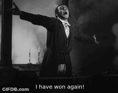 A Man With His Arms Outstretched And The Words I Have Won Again GIF