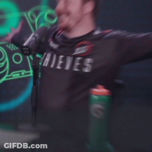 A Man With His Arms Outstretched And The Words I 'M Back Baby Above Him GIF