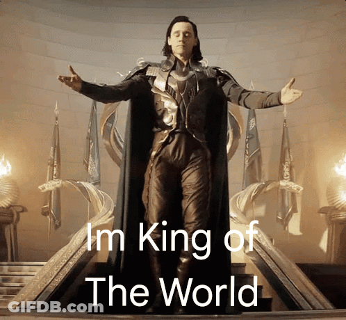 A Man With His Arms Outstretched And The Words I 'M King Of The World GIF