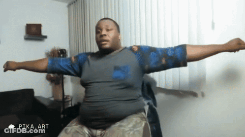 A Man With His Arms Outstretched In A Room With Pika.art Written On The Bottom GIF