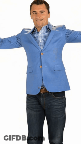 A Man With His Arms Outstretched Wearing A Light Blue Jacket GIF