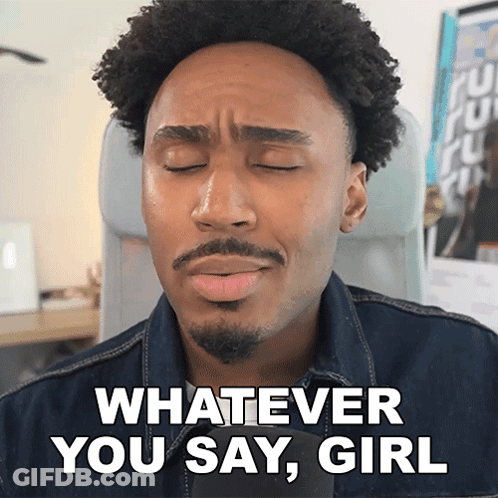 A Man With His Eyes Closed And A Beard Says Whatever You Say Girl GIF