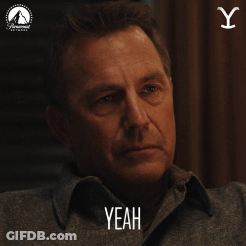A Man With His Eyes Closed And The Word Yeah On His Face GIF