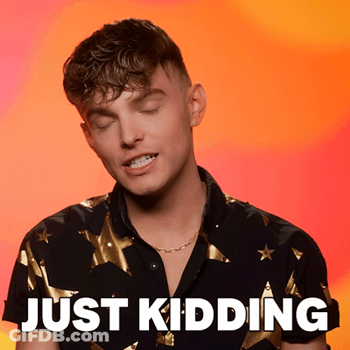 A Man With His Eyes Closed And The Words Just Kidding Written Below Him GIF