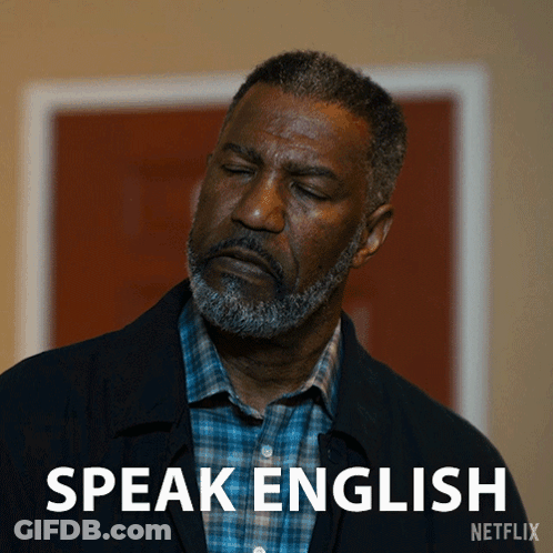 A Man With His Eyes Closed And The Words Speak English Written Below Him GIF