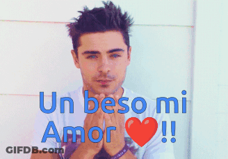 A Man With His Eyes Closed And The Words " Un Beso Mi Amor " On The Bottom GIF