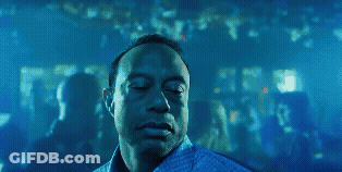 A Man With His Eyes Closed In A Blue Shirt GIF