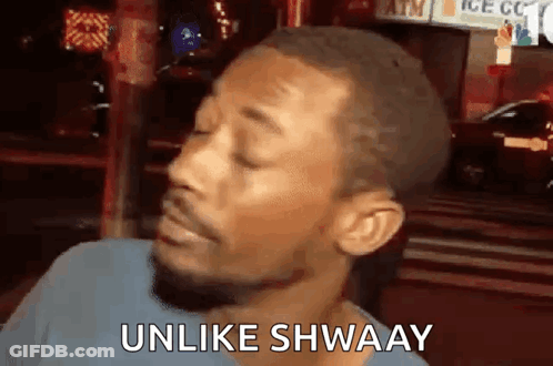 A Man With His Eyes Closed Is Making A Funny Face And Saying Unlike Shwaay GIF
