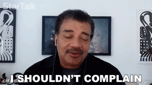 A Man With His Eyes Closed Is Saying I Should N't Complain . GIF