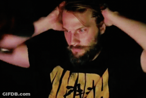 A Man With His Eyes Closed Is Wearing A Black Shirt With The Word Faith On It GIF