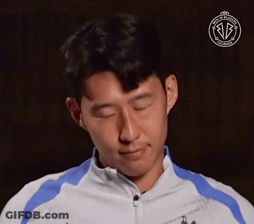 A Man With His Eyes Closed Is Wearing A Jacket That Says Made In Blazers GIF