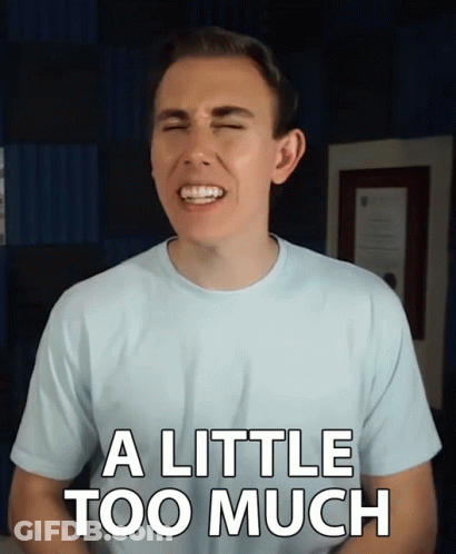 A Man With His Eyes Closed Is Wearing A Shirt That Says " A Little Too Much " GIF