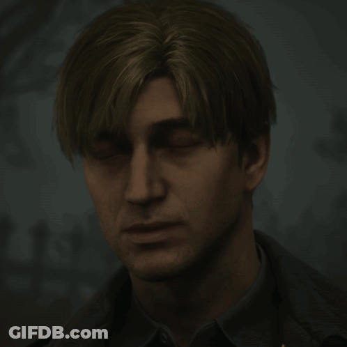 A Man With His Eyes Closed Looks Down At Something GIF