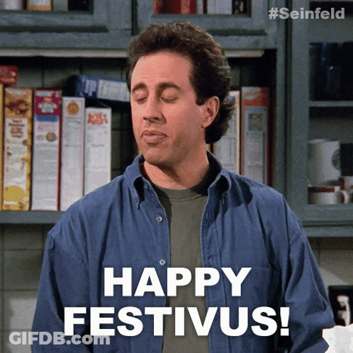 A Man With His Eyes Closed Says " Happy Festivus " GIF