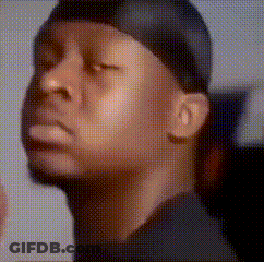 A Man With His Eyes Closed Wearing A Bandana GIF