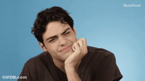 A Man With His Hand On His Chin And Buzzfeed Written On The Bottom GIF