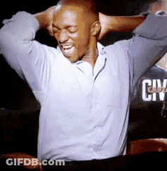 A Man With His Hands Behind His Head Is Wearing A Shirt That Says Civ GIF