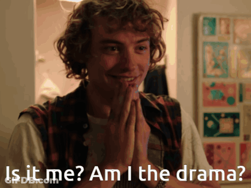 A Man With His Hands Folded And The Words Is It Me Am I The Drama Written Below Him GIF