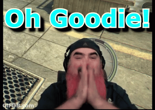 A Man With His Hands Folded In Front Of His Face With The Words Oh Goodie Written Above Him GIF