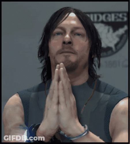A Man With His Hands Folded Praying In Front Of A Sign That Says Ridges GIF