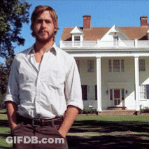 A Man With His Hands In His Pockets Stands In Front Of A Large White House GIF