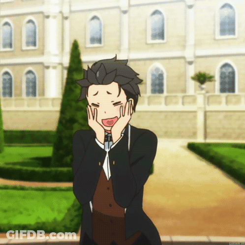A Man With His Hands On His Face Stands In Front Of A Large Building GIF