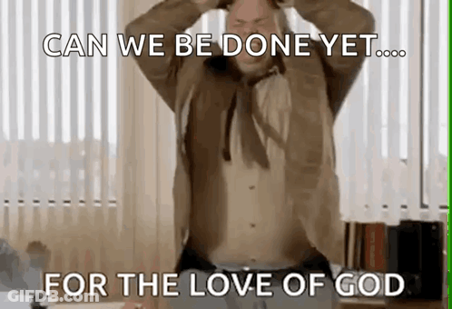 A Man With His Hands On His Head Is Standing In Front Of A Window . GIF