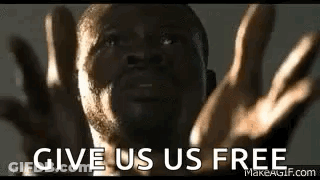 A Man With His Hands Outstretched And The Words `` Give Us Us Free '' Written On His Face . GIF