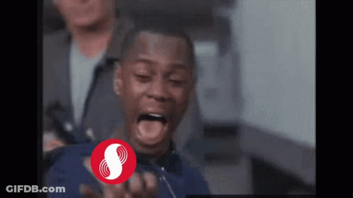 A Man With His Mouth Open And A Red Circle With The Letter S In It GIF