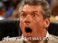 A Man With His Mouth Open And A Surprised Look On His Face . GIF