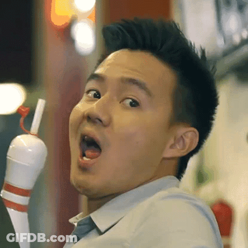 A Man With His Mouth Open Holds A Bowling Pin In His Hand GIF