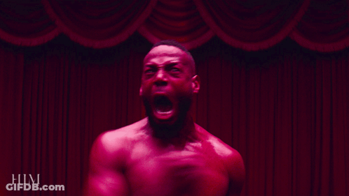 A Man With His Mouth Wide Open And The Word Him Behind Him GIF