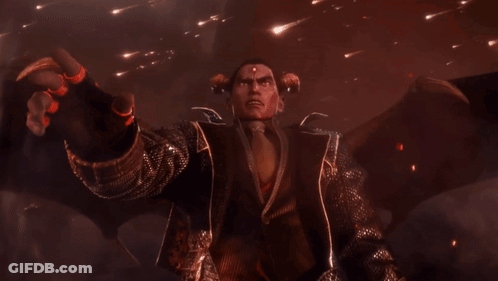 A Man With Horns And Wings Is Standing In Front Of A Fireball GIF