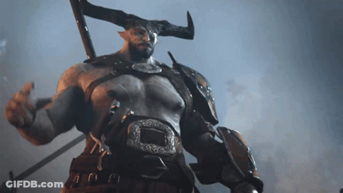 A Man With Horns Is Holding A Sword And A Belt GIF