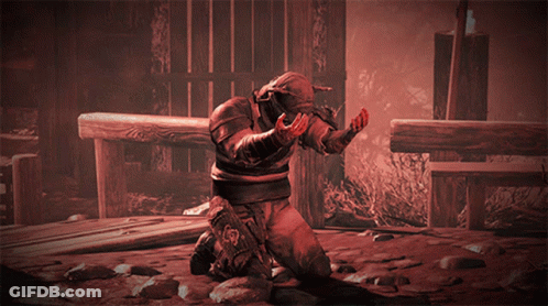 A Man With Horns On His Head Is Kneeling On The Ground GIF