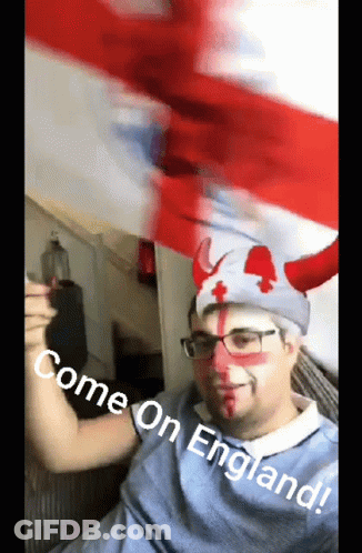 A Man With Horns Painted On His Face And The Words Come On England Written Below Him GIF