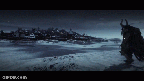 A Man With Horns Stands On A Snowy Hill In Front Of A Snowy Village GIF