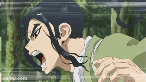 A Man With Long Black Hair And A Green Shirt Is Screaming GIF