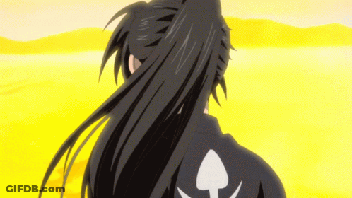 A Man With Long Black Hair And A White Spade On His Back GIF