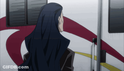 A Man With Long Black Hair Is Standing In Front Of A Red And White Rv GIF