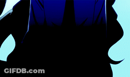 A Man With Long Black Hair Is Wearing A Blue Suit And A Tie GIF