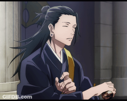 A Man With Long Black Hair Is Wearing A Kimono And Holding Something In His Hand GIF