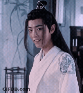 A Man With Long Black Hair Wearing A White Kimono GIF