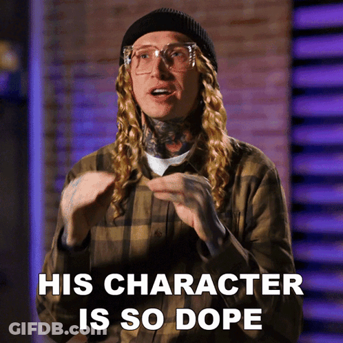 A Man With Long Blonde Hair And Glasses Says " His Character Is So Dope " GIF