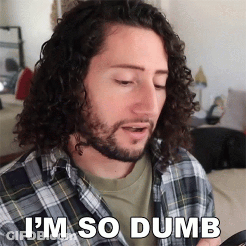 A Man With Long Curly Hair And A Beard Says I 'M So Dumb GIF