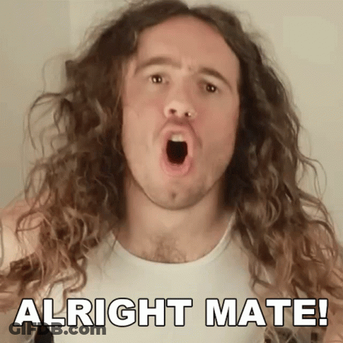A Man With Long Curly Hair Has His Mouth Open And The Words Alright Mate Below Him GIF