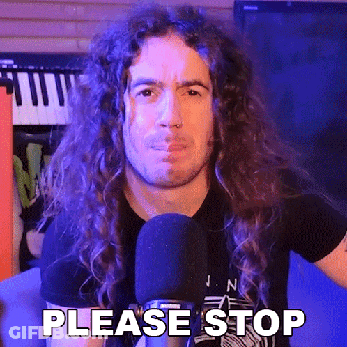 A Man With Long Curly Hair Is Talking Into A Microphone And Saying Please Stop . GIF